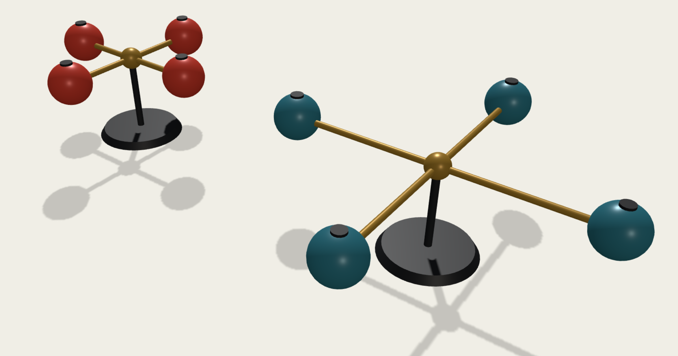 Le sfere blu e le rosse hanno la stessa massa, ma le blu sono più lontane dall'asse di rotazione (il perno verticale). Per questo è più difficile cambiare la velocità di rotazione del sistema a destra che di quello a sinistra.