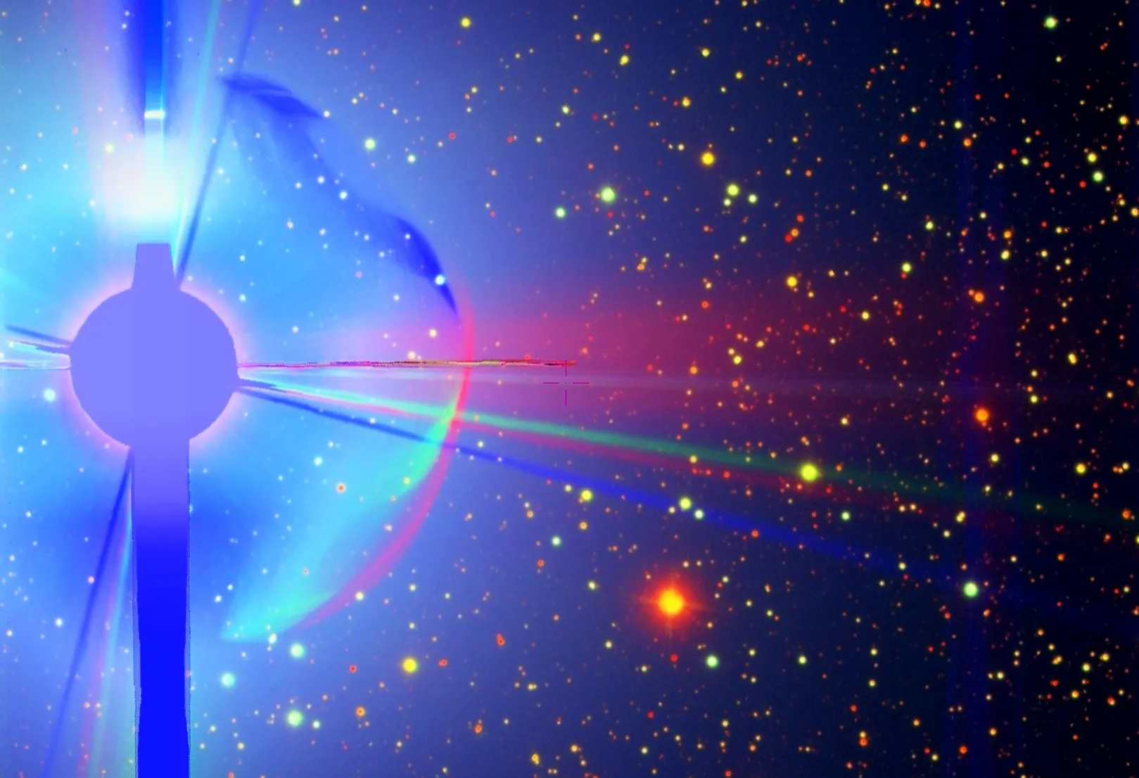 Deneb, sulla sinistra, in un’immagine a colori tratta dalla Sloan Digital Sky Survey 9. Pur mascherata, Deneb è così luminosa da annegare nel suo bagliore buona parte delle stelle circostanti.